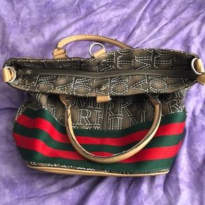 Large Marktomi multi-use hand bag;